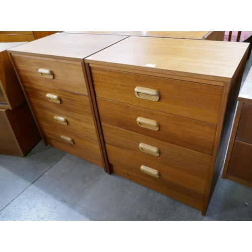 72 - A pair of teak chests of drawers