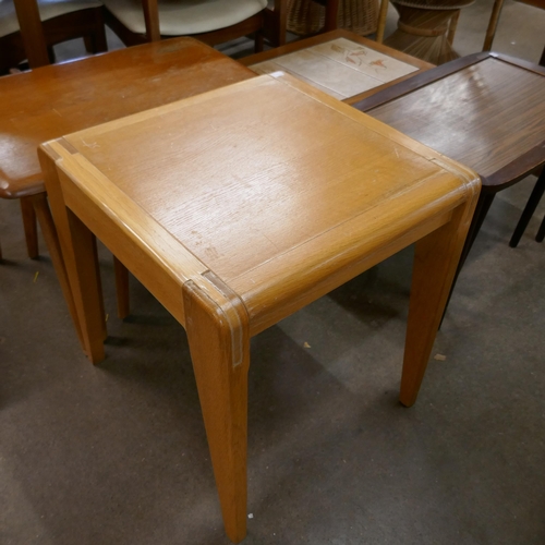 92F - An oak nest of tables, a simulated rosewood nest of tables and two occasional tables