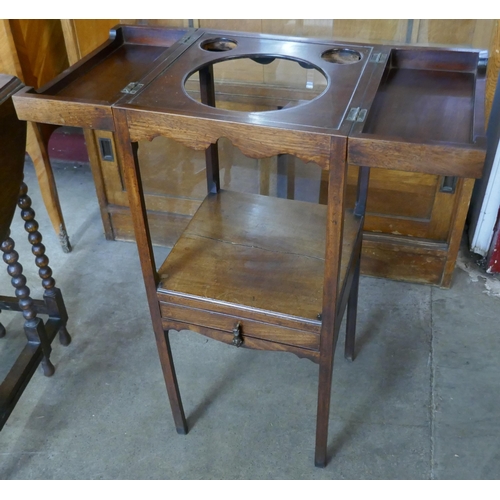 98 - A George III mahogany washstand with fold-over top