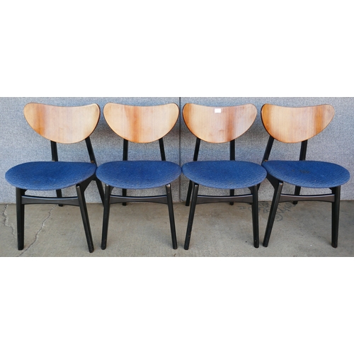 93A - A set of four G-Plan Librenza tola wood and black butterfly-back dining chairs