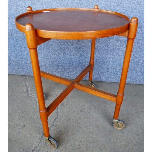 93E - A Danish teak circular cocktail trolley, retailed by Hopewells of Nottingham