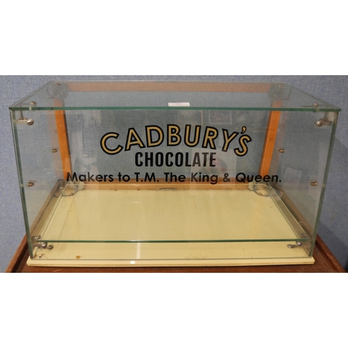 366 - A shop display cabinet, bearing Cadbury's inscription