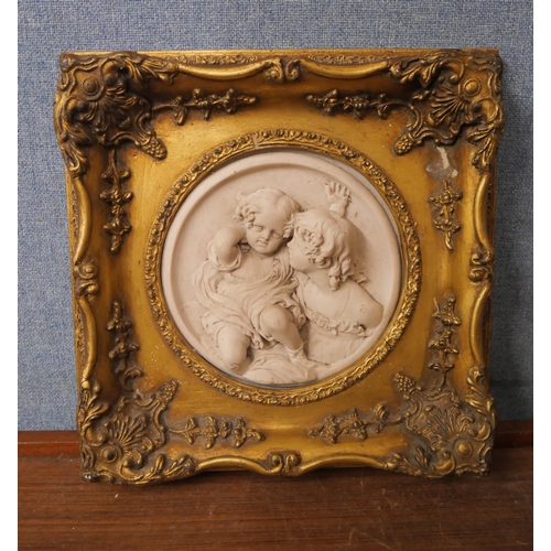 368 - An Italian style faux marble plaque, in gilt frame