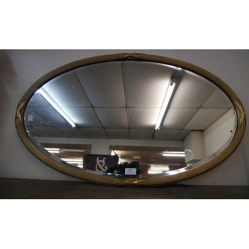 383 - A Victorian oval gilt framed mirror