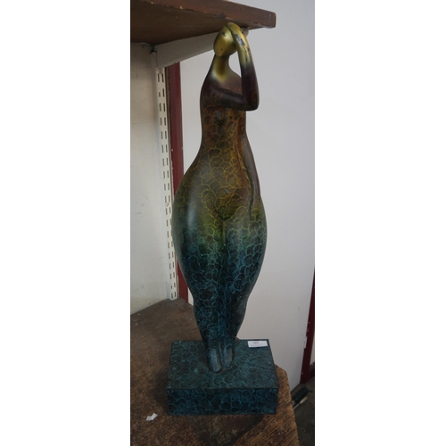 385 - A Surrealist style bronze figure of a lady