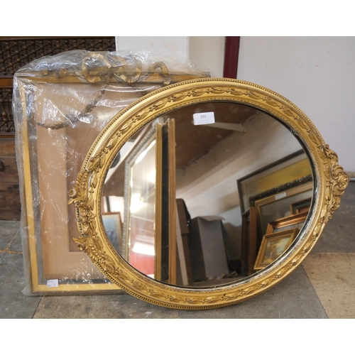 395 - A Victorian style gilt framed oval mirror and a gilt frame, a/f