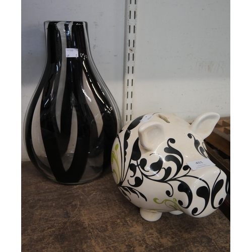 401 - A ceramic figure of a pig and a studio glass vase