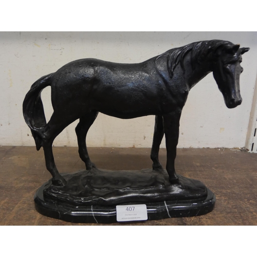 407 - A bronze figure of a horse