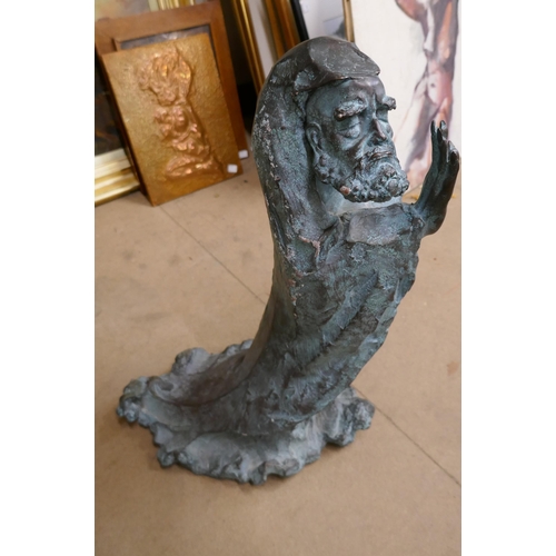 377C - A large Surrealist style bronze figure of a man