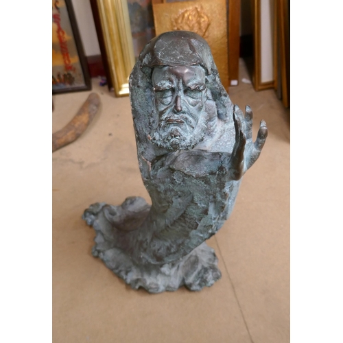 377C - A large Surrealist style bronze figure of a man