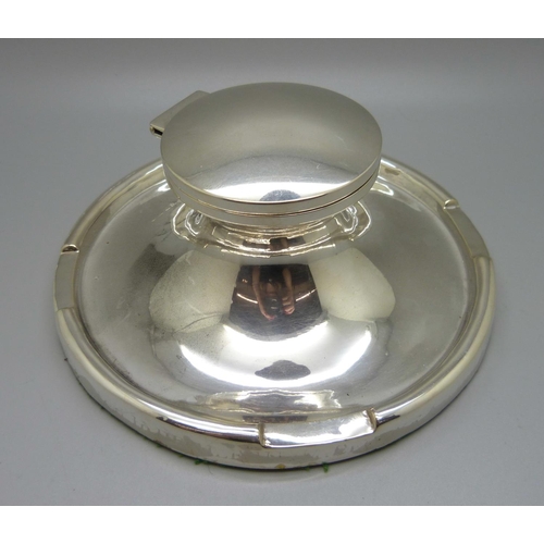 854 - A large silver Capstan inkwell, worn Birmingham hallmark, diameter of base 17.5cm