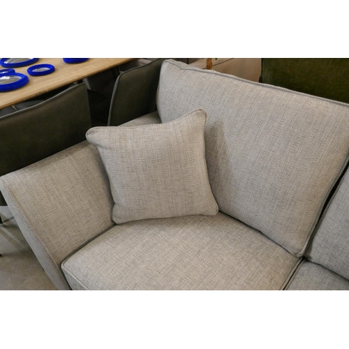 1322 - A Grey weave large two seater sofa