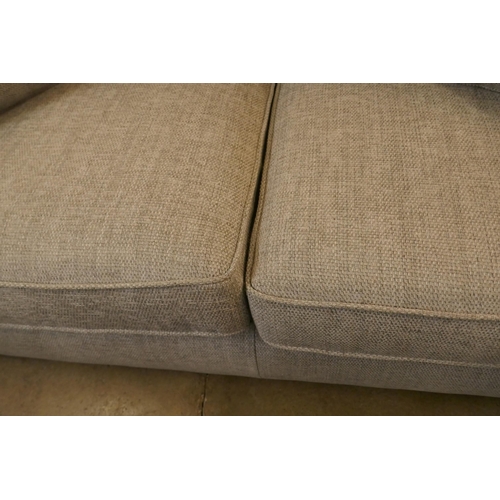 1322 - A Grey weave large two seater sofa