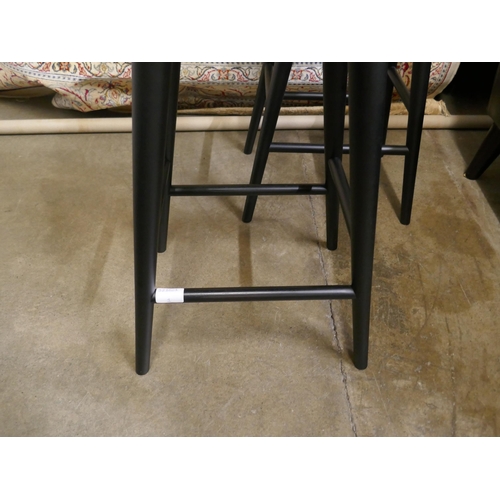 1345 - A pair of black beech FDB Mobler Mikado stools