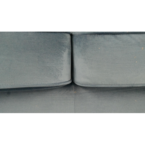 1420 - A blue velvet Hoxton three seater sofa