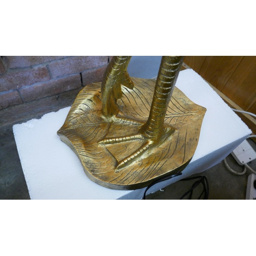 1506 - A gold floor standing lamp in the form of a flamingo RRP £459