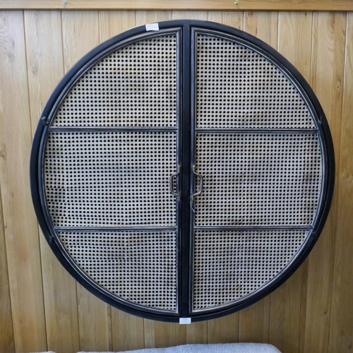 1516 - A large circular steel wall mounted cabinet RRP £264