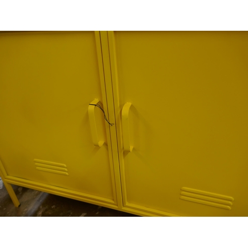 1440 - A large yellow industrial style cabinet