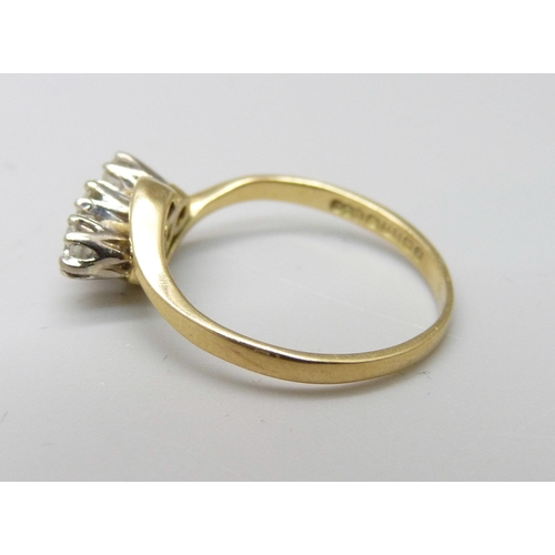 1002 - An 18ct gold and three diamond ring, 2.3g, K