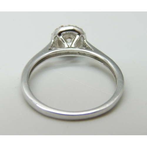 1003 - An 18ct white gold and diamond ring, 0.5ct total diamond weight marked on the shank, 2.7g, M, lackin... 