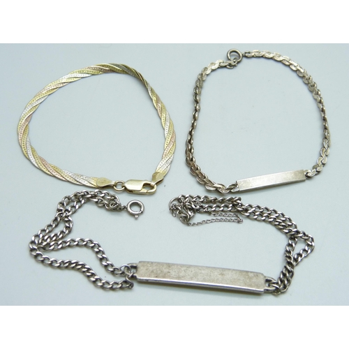 1011 - Two silver ID bracelets and one other silver bracelet, 21g