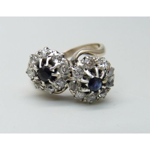 1020 - A sapphire and diamond double cluster ring, shank marked 950, 4.1g, P