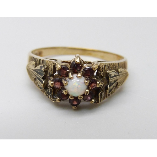 1024 - A 9ct gold, opal and garnet cluster ring, 3.3g, R