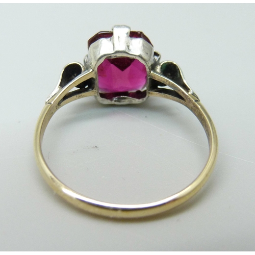 1026 - A 9ct sold and silver red stone solitaire ring, P/Q