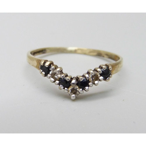 1028 - A 9ct gold, sapphire and zircon wishbone ring, 1.1g, O