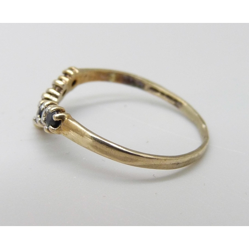 1028 - A 9ct gold, sapphire and zircon wishbone ring, 1.1g, O