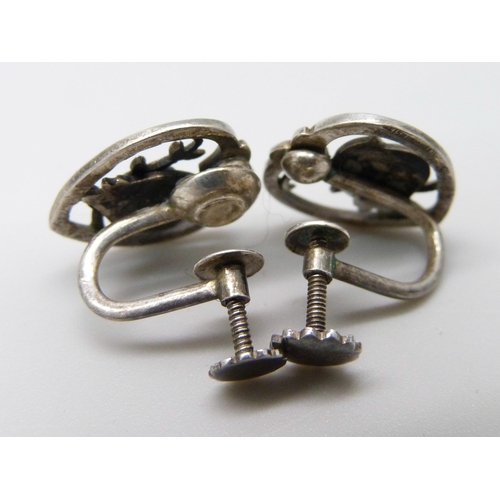 1029 - A pair of Georg Jensen earrings by Arno Malinowski, screw backs