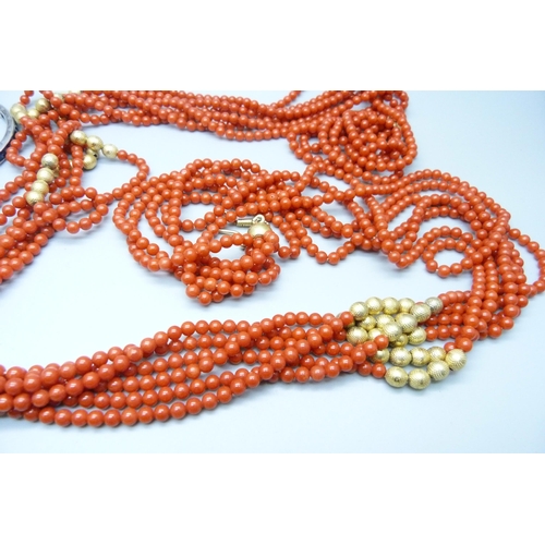 1061 - A vintage silver gilt and faux coral necklace, approximately 107cm, and two white metal and stone se... 