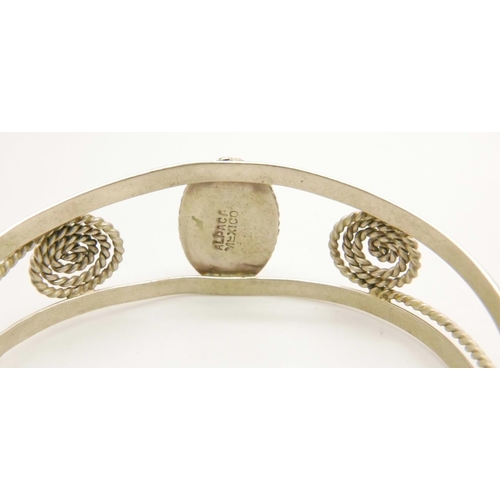 1069 - A Mexico silver bangle and a 925 silver bracelet