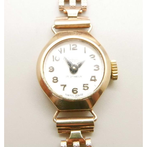 1076 - A lady's 9ct gold Rone wristwatch, on a later 9ct gold strap, with box and receipt, total weight wit... 