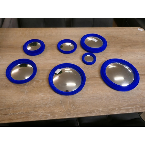 1324 - A set of Six Blue flocked convex mirrors