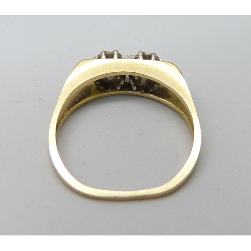 1038 - An 18ct gold and two stone diamond ring, 2.2g, J