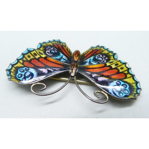 1050 - A silver and enamel butterfly brooch, 55mm