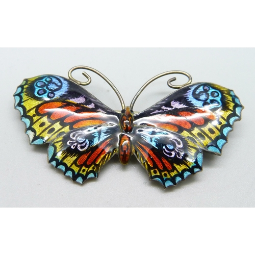 1050 - A silver and enamel butterfly brooch, 55mm