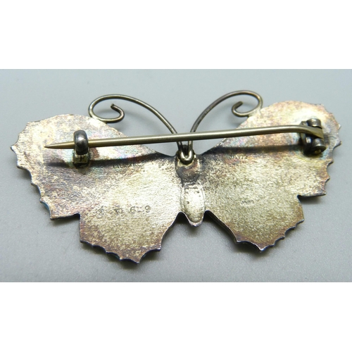 1050 - A silver and enamel butterfly brooch, 55mm