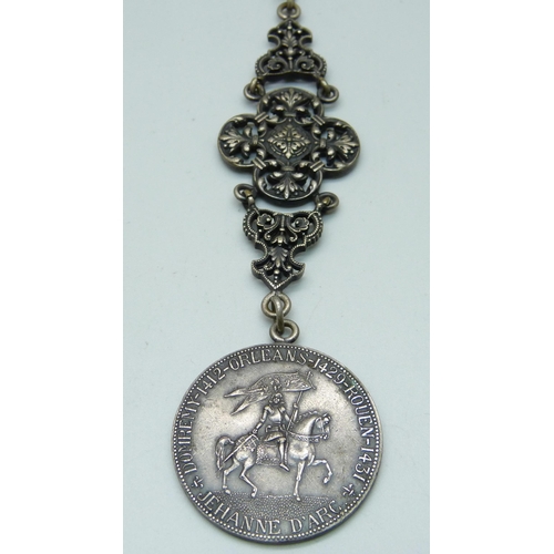 1051 - An Antique Joan of Arc medallion/fob, length 17.5cm