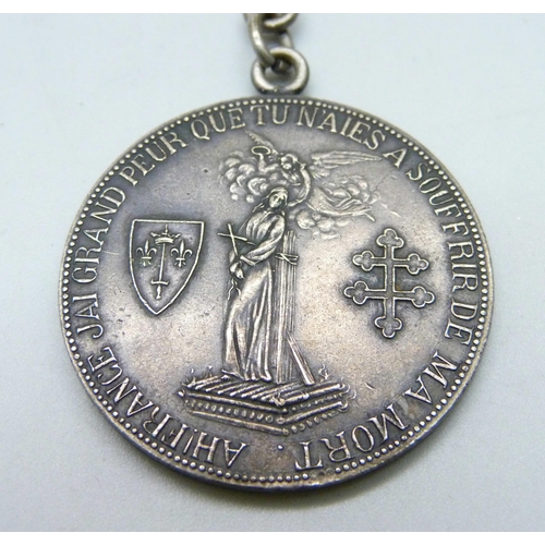 1051 - An Antique Joan of Arc medallion/fob, length 17.5cm