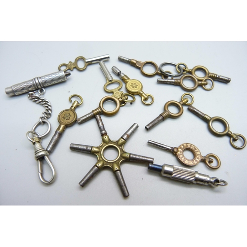 1060 - A collection of watch keys including a silver universal bench key on a silver chain and advertising