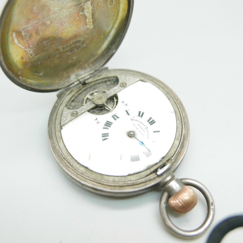 1090 - A silver cased Hebdomas 8 Days full-hunter pocket watch, (lacking inner bezel)