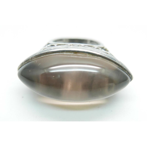 1097 - A silver ring set with a large brown cabochon stone, 19.5g, N, 36mm wide