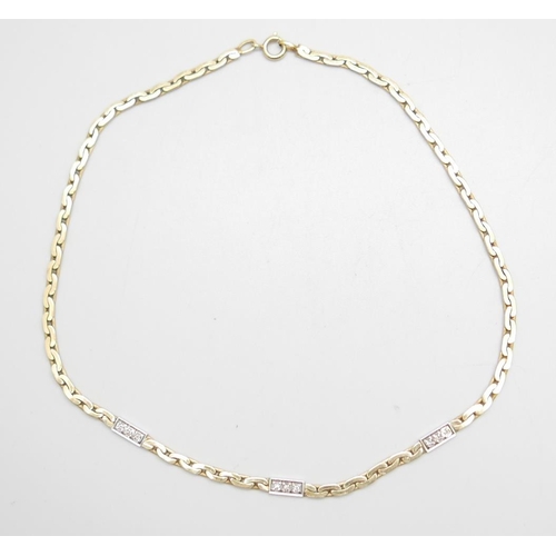 1105 - A 9ct gold and diamond necklace, 16.6g, 39cm