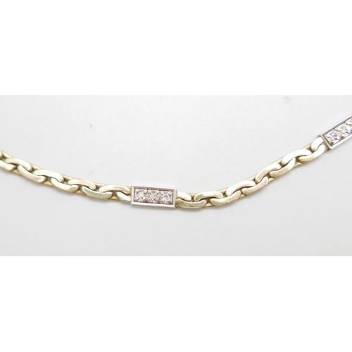 1105 - A 9ct gold and diamond necklace, 16.6g, 39cm