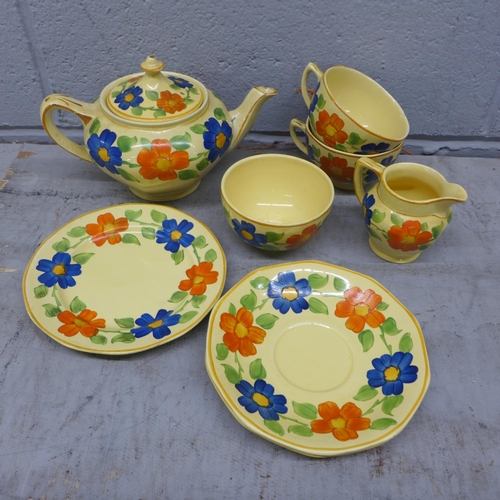 1163 - A tea set from Barker Bros ltd, 'June Day' two tea cups, 3 saucers, teapot, sugar and milk jug **PLE... 