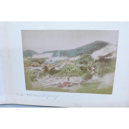 631 - A Japanese lacquered photograph album with Japan photographs including Kobe, Yokohama, Kyoto, Cherry... 