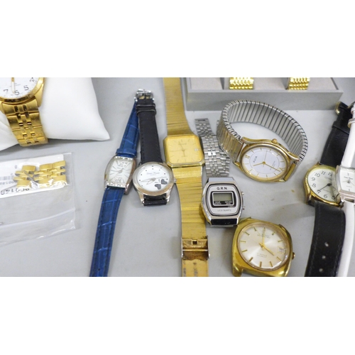 674 - A collection of wristwatches, five boxed