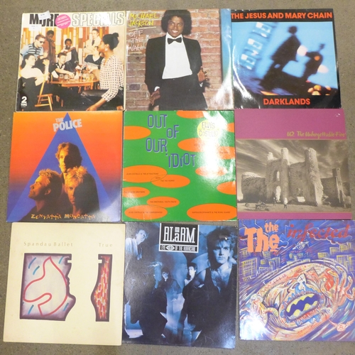 678 - Fifteen LP records from 1980s and 1990s, The Specials, Michael Jackson, The Jesus and Mary Chain, Ni... 